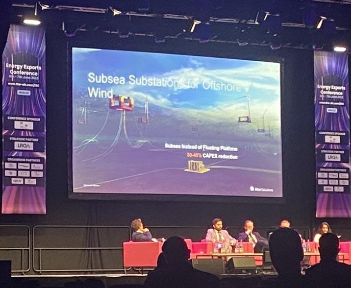 This image shows one of the panel discussions from the EIC's Energy export conference in 2023. The panels are made up of experts in offshore energy technology. The slide features a floating offshore wind substation and turbines. With Jo Bird's track record in offshore wind, this would have been of great interest.
