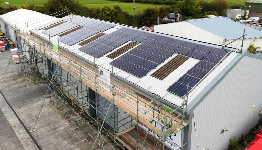 The photo shows the new 20KW array of solar panels fitted to the roof of the Jo Bird warehouse by Ecocetera last week.